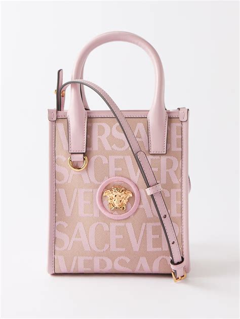 versace pink cross body bag